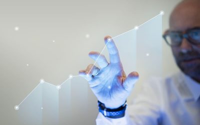 businessman-pointing-his-finger-growth-graph