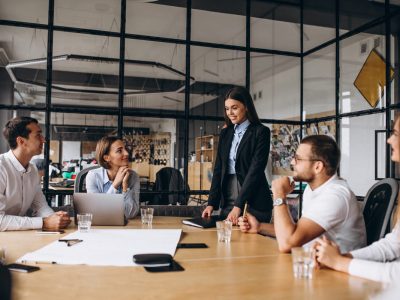 group-people-working-out-business-plan-office